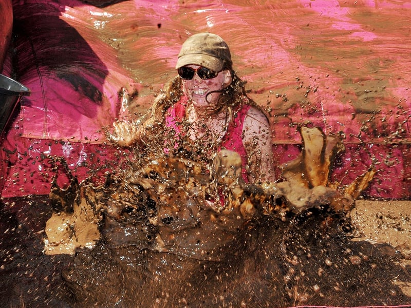 Julie Watson, of Bingley, is rather muddy in the Pretty Muddy Race For Life.