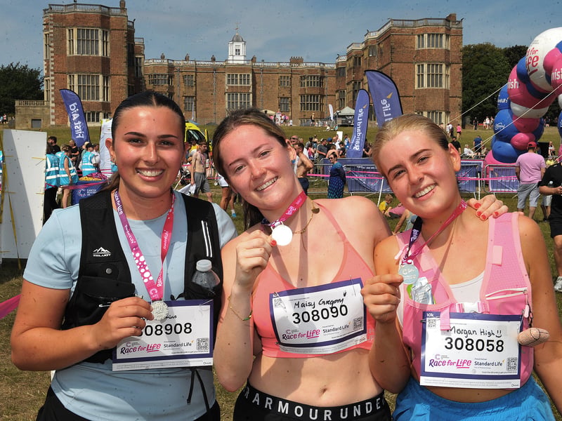 Ava Jenkins, Maisy Gregory and Morgan High with their 10K medals.