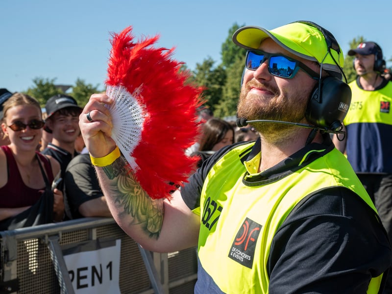 A steward cools down in the heat. 