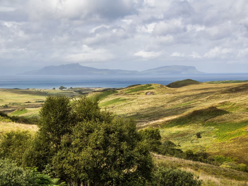 Eigg is one of the Small Isles, and it’s packed with personality. Known for its striking silhouette, the island’s centrepiece is the Sgùrr of Eigg, a volcanic ridge offering stunning views of Skye and Rum. Take a walk to the top or visit the Singing Sands at Laig Bay, where the beach makes gentle sounds beneath your feet. Wildlife lovers might spot seals, dolphins and whales from the shore or on boat trips. Eigg is proudly self-sufficient, powered almost entirely by renewable energy, and has a close-knit community known for its creativity and conservation work. The island’s lively music scene is a true highlight. From traditional ceilidhs and folk sessions to contemporary gigs featuring avant-garde, techno, and rock, there’s always something to get your toes tapping.