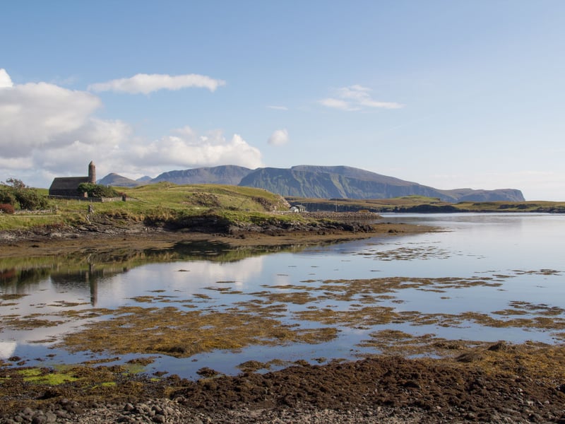 Often called ‘The Garden of the Hebrides’, Canna is a peaceful island full of wildlife and rich history. This island has been inhabited for over 7,000 years, dating back to 5000 BC, and today supports a close-knit crofting community that continues the tradition of island life. Life on Canna moves at its own gentle pace, inviting you to slow down and truly connect with nature. It’s a fantastic place for wildlife watching. Look out for basking sharks in the waters, or spot sea eagles soaring overhead. Take time to wander through wildflower meadows, explore the fascinating Canna House and its gardens, and treat yourself to homemade cakes at the cosy island café. With its creative spirit and regular music events, Canna is a dream for walkers, birdwatchers, and anyone looking for inspiration off the beaten track.