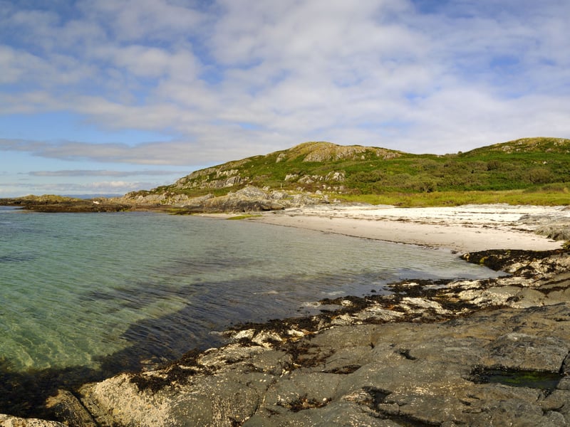 With its white sandy beaches and clear turquoise seas, Gigha offers a tranquil island escape full of natural beauty and charm. This island is known for its community spirit, colourful gardens, and laid-back atmosphere. Why not stay a little longer and experience Gigha at its best? Wake to the sound of the waves, take your time exploring the enchanting Achamore Gardens, or set off on a gentle cycle along winding single-track roads. Savour freshly caught seafood at the waterfront Boathouse restaurant, and watch for seabirds, seals, and spectacular views. 