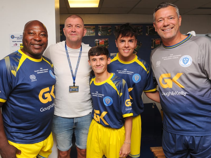 In the Team Gray dressing room former Leeds United players Clyde Wijnhard, Dominic Matteo and Neil Sullivan pose with Coronation Street stars Kyron Bowes and Luca Toolan