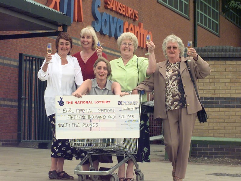 Lottery syndicate winners Cheryl Dodd, Diana Johnson, Olga Raynes, Doreen Baker and Diana Johnson celebrate at Savacentre, where they bought their winning ticket, in 1999