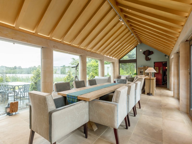 On the ground floor, there is a dining room, connected to the inner courtyard with its Chess Board and the kitchen. It is complete with Caithness stone flooring and pillars. 
