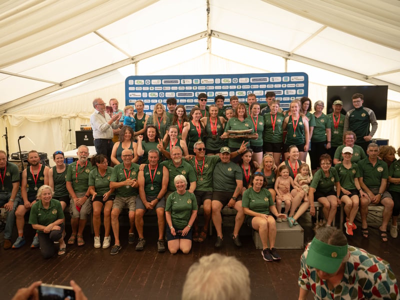 Dundrum Coastal Rowing Club from Country Down enjoy the glory of their fourth world title.