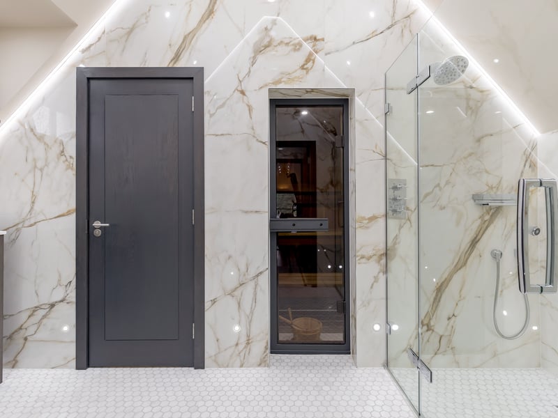 Just off the gym, the shower room here includes a sauna.