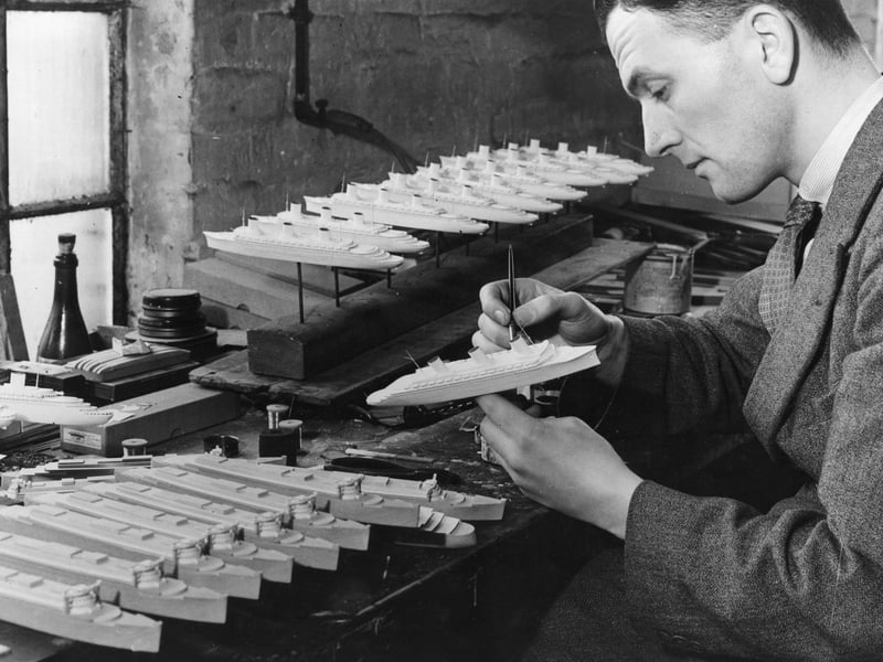 A craftsman in Northampton works on souvenir models of the French liner 'Normandie', which has just completed its maiden Atlantic crossing, on June 4, 1935