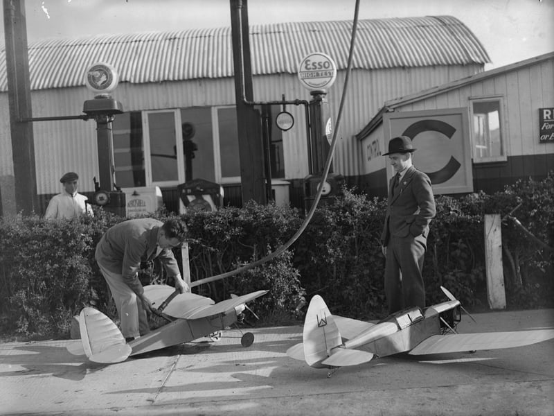 Model aeroplanes getting refuelled at Sywell Aerodrome, Northampton, in June 1935