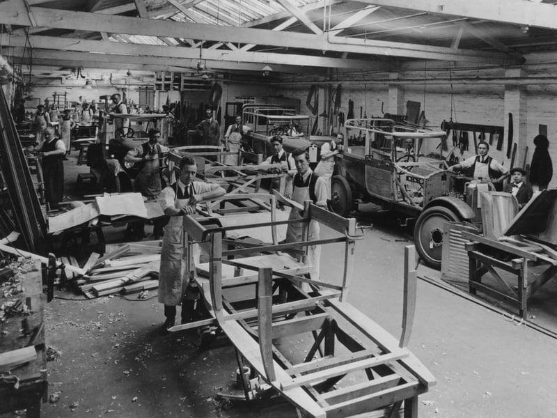 Workers on the production line at Arthur Mulliner's coachbuilding works, Northampton, in around 1923. Mulliner's provided coachwork for Rolls Royce cars.