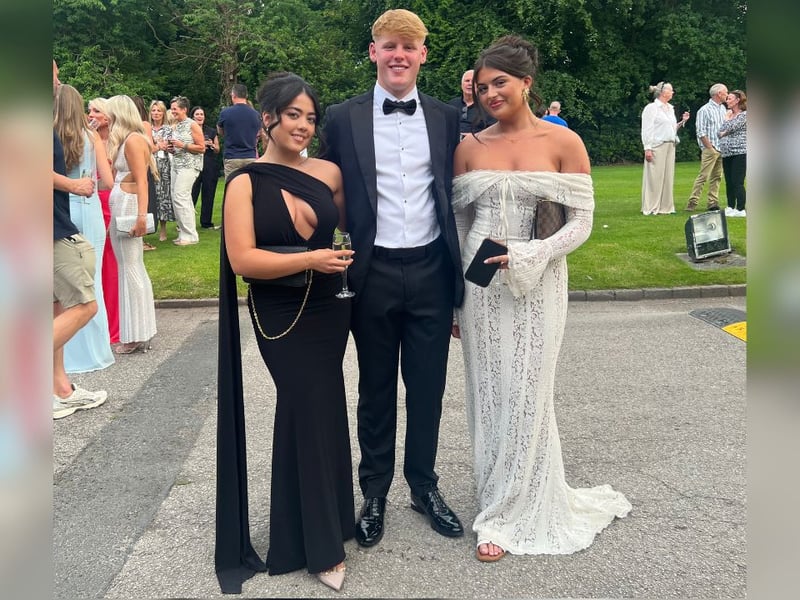 A trio of sophisticated prom goers