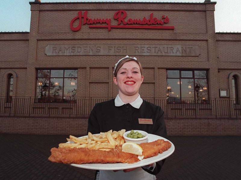 Waiter  Kelly Murphy with a special fish supper at Harry Ramsden's Glasgow restaurant in 1997