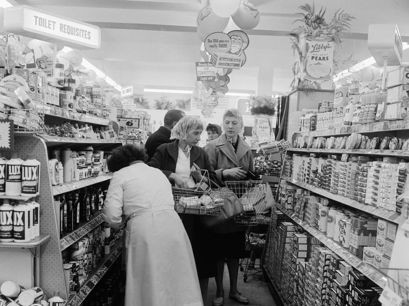 Shoppers in the toiletry aisle of a Tesco supermarket in May 1960
