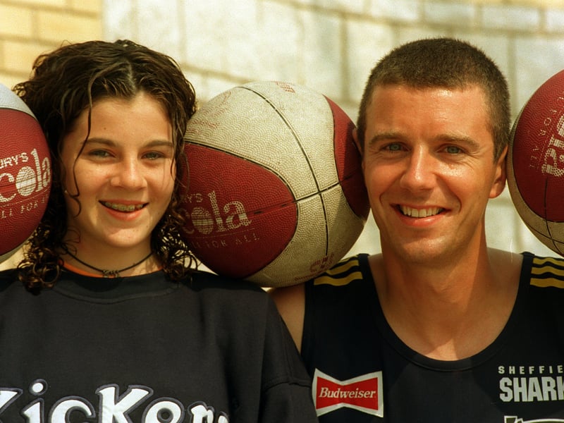 Danielle Pervin, left, meets Sheffield Sharks basketball player Richard North during Sainsbury's Classic Cola Basketball roadshow in August 1997.