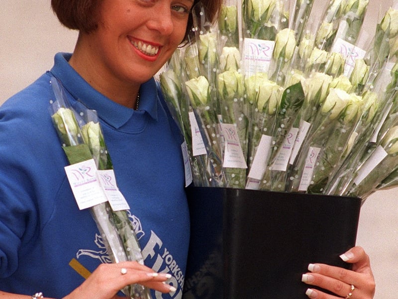 A lady from YEP promotions was at opening with white roses in March 1997.