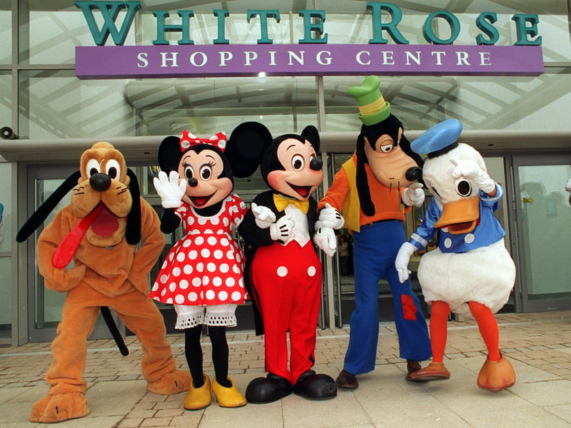 Disney characters at the opening in March 1997. Pictured, from left, are Pluto, Minnie Mouse, Mickey Mouse, Goofy and Donald Duck.