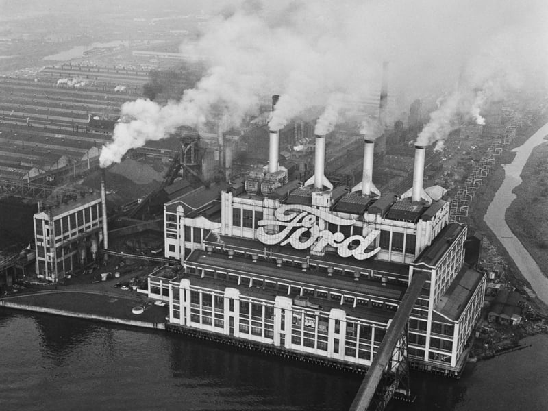The Ford Motors car factory on the River Thames at Dagenham pictured sending smoke billowing into the sky in December 1960