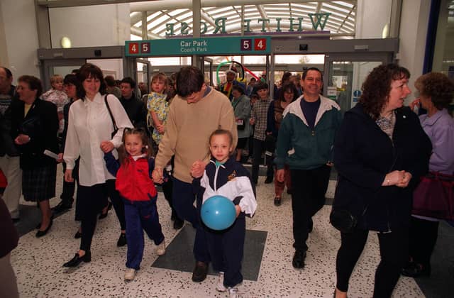 The rush begins as the doors are opened for the first time in March 1997.