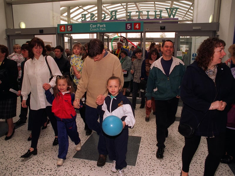The rush begins as the doors are opened for the first time  in March 1997.