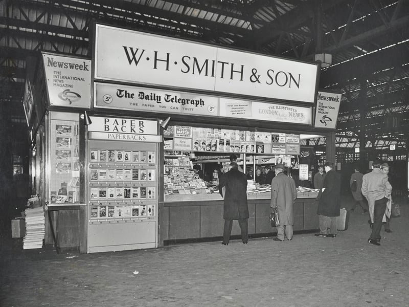 A WHSmith book stall at Waterloo Station, London, in 1960