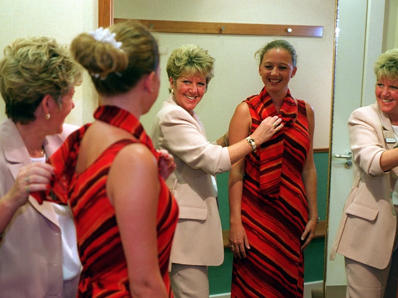 Debenham's personal shopper, Paula Lyness, right, dresses Paula Dixon in July 1997.