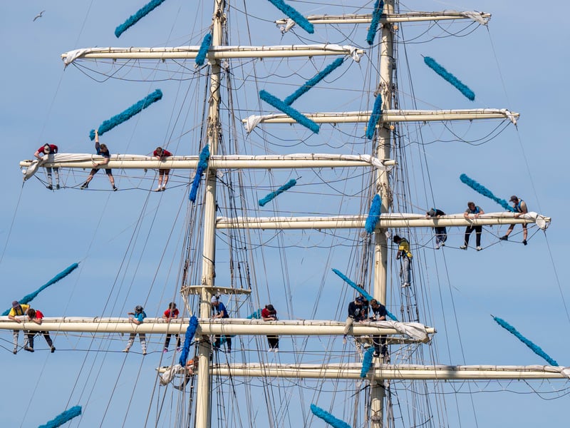 Crews attend to the sails and rigging onboard the Fryderyk Chopin. Built between 1990-92, the ship was named after the polish nineteenth century musical composer