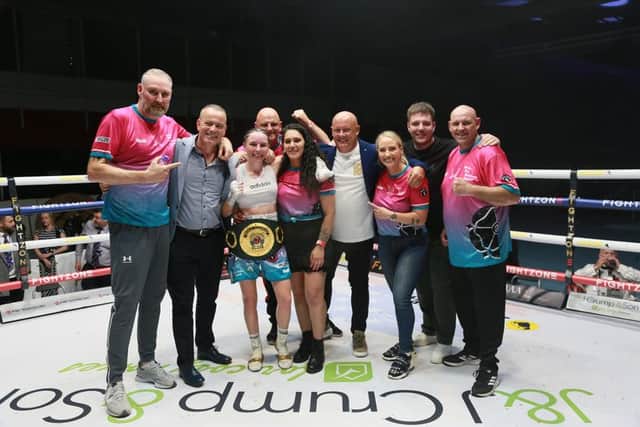 A victorious Nicola Hopewell and team