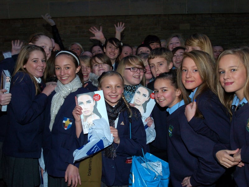Excited fans wait in the queue for Katie Price at her book signing at WHSmith in Lancaster