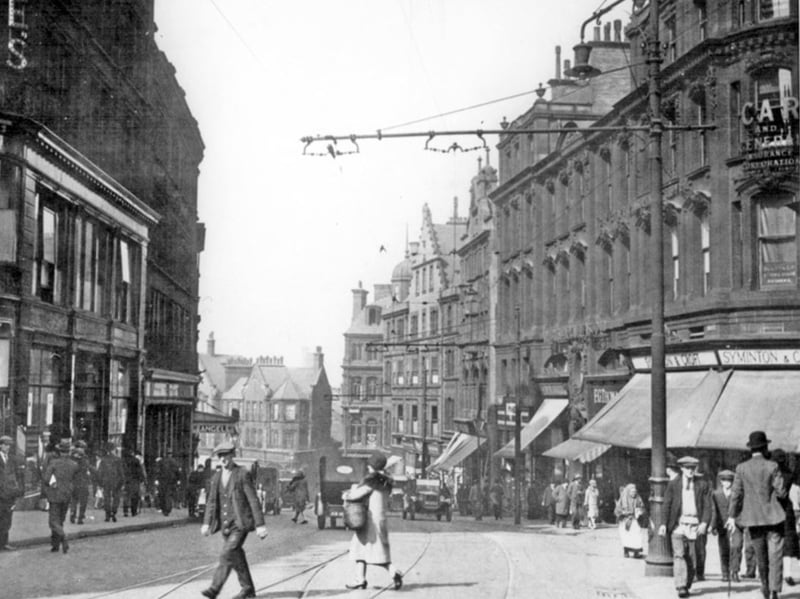 Angel Street, Sheffield, pictured some time between 1920 and 1939, with Snig Hill in the background