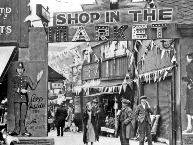 Sheffield's old Sheaf Market, also known as the Rag 'n' Tag, pictured some time between 1920 and 1939, with the illuminated sign above the Broad Street entrance