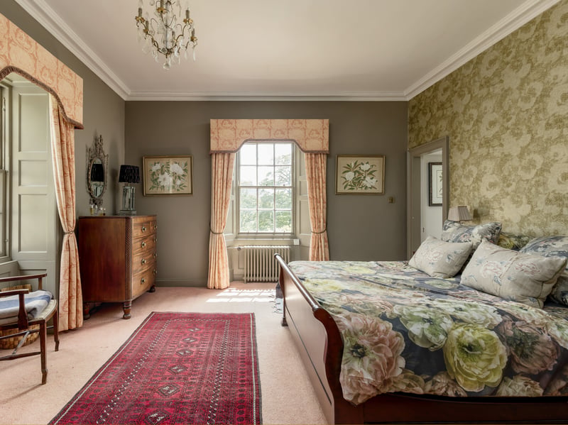 The generous principal suite has views over the grounds, a dressing room and en suite bathroom
