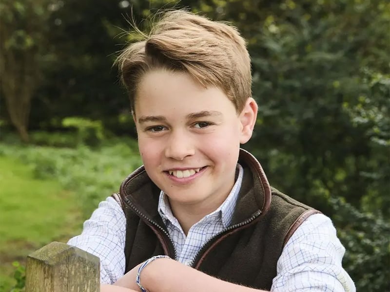 Taken by photographer Josh Shinner earlier this year in Norfolk, the image shows George smiling at the camera.