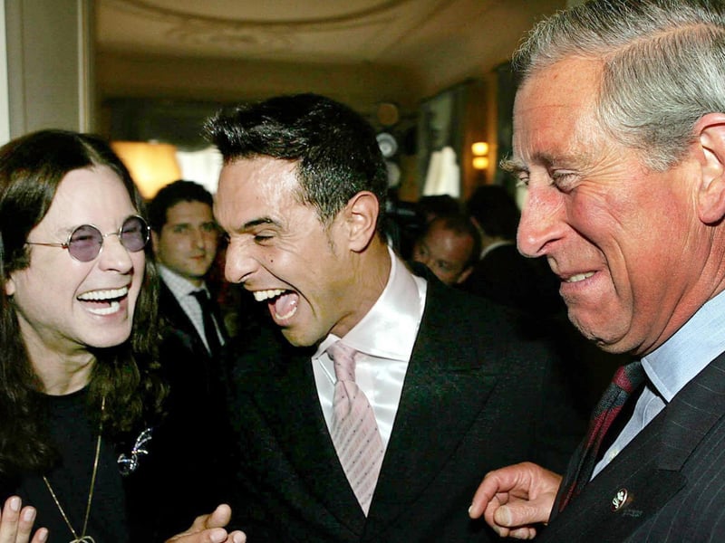 In an image from 2006, Ozzy Osbourne shares a joke with X Factor star Chico and the then Prince of Wales during a reception at Clarence House for those lending their support to a star-studded concert celebrating the 30th birthday of the Prince's Trust.