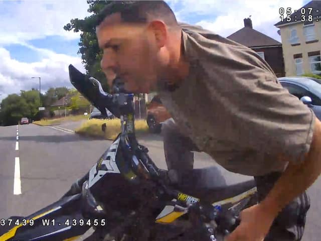 Police want to speak to this man after a motorcyclist with no registration plates failed to stop for police in Sheffield on July 5.