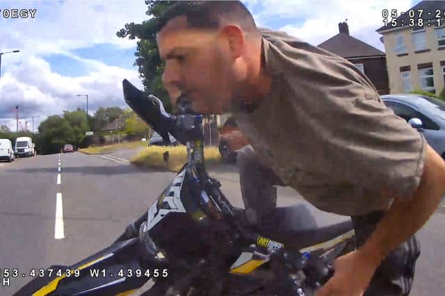 Police want to speak to this man after a motorcyclist with no registration plates failed to stop for police in Sheffield on July 5.