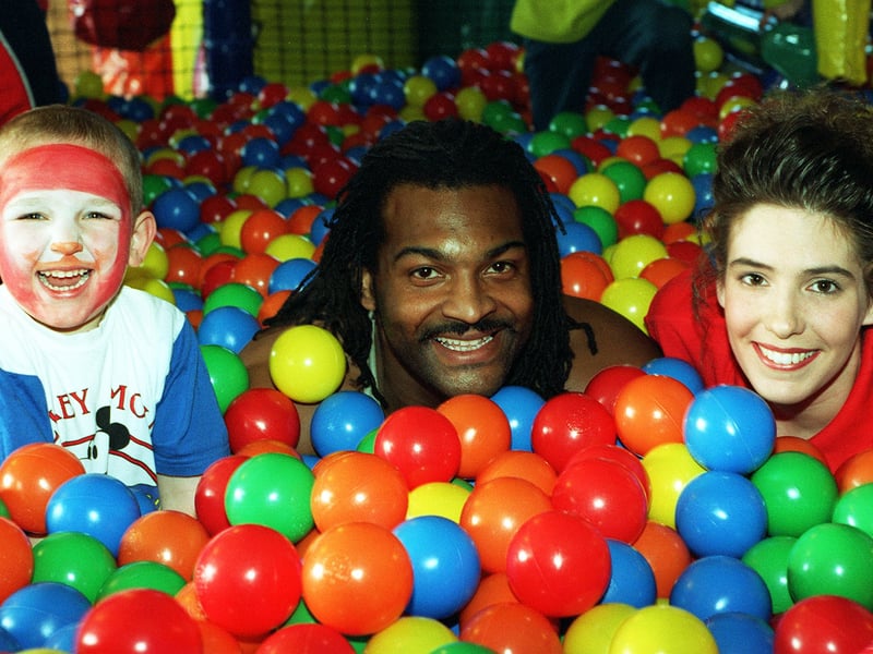 Saracen, from the TV show Gladiators, at the official opening of the Wacky Warehouse at The Highwayman pub on the Great North Road, Woodlands, Doncaster, in 1998. He's pictured in the ball pit with four-year-old Jack Rich and Wacky Warehouse assistant Amanda Dickens.