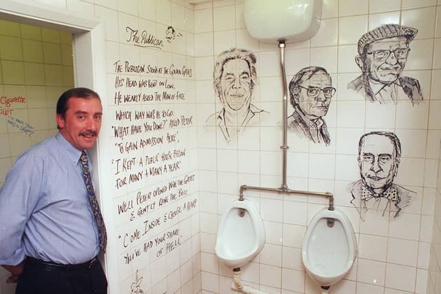 Manager Mike Kilner with the artwork in the gents' toilets at the Sportsman Inn, on Redmires Road, Lodgemoor, Sheffield, in 1999