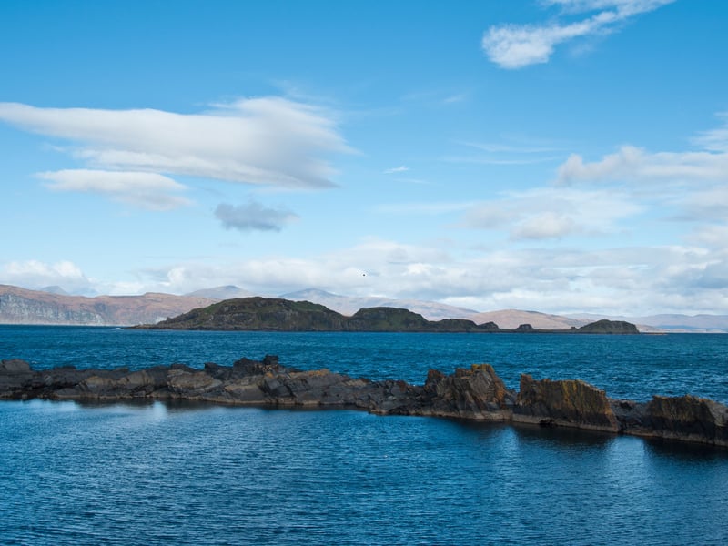 Looking at a map you'd be forgiven for thinking the island of Seil is part of the mainland, but it's actually an isle reachable by driving over the evocative-sounding Bridge Over The Atlantic - on the road south from Oban. It's one of the Slate Islands. Once there you can enjoy the gardens of An Cala, visit the Slate Islands Heritage Centre and have a round of golf on the picturesque Seil golf course.