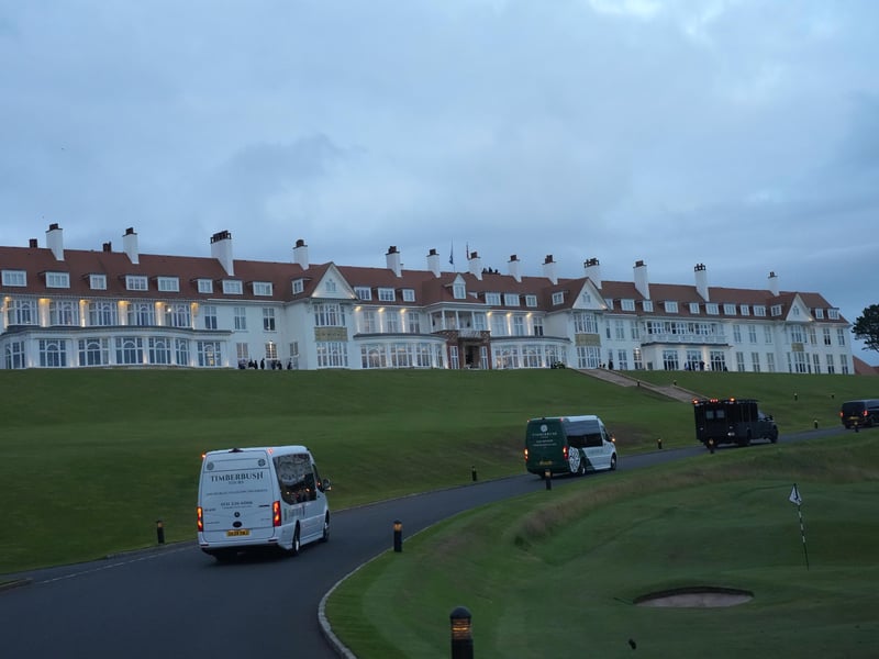  Vehicles from US President Donald Trump's motorcade make their way to Turnberry Golf Course