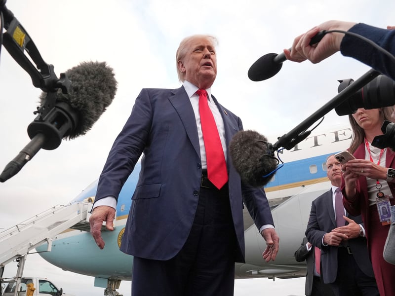 President Donald Trump speaks to members of the media