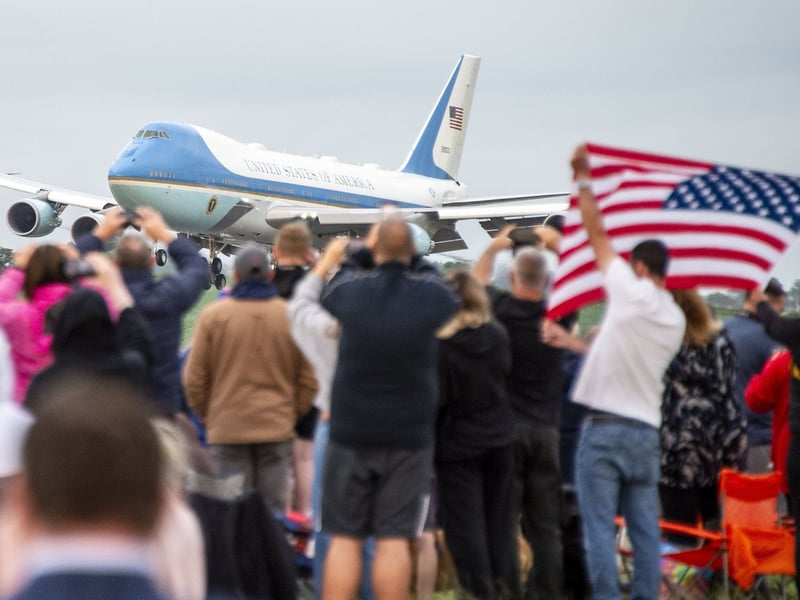 Many people gathered to watch the plane - and to greet the President 