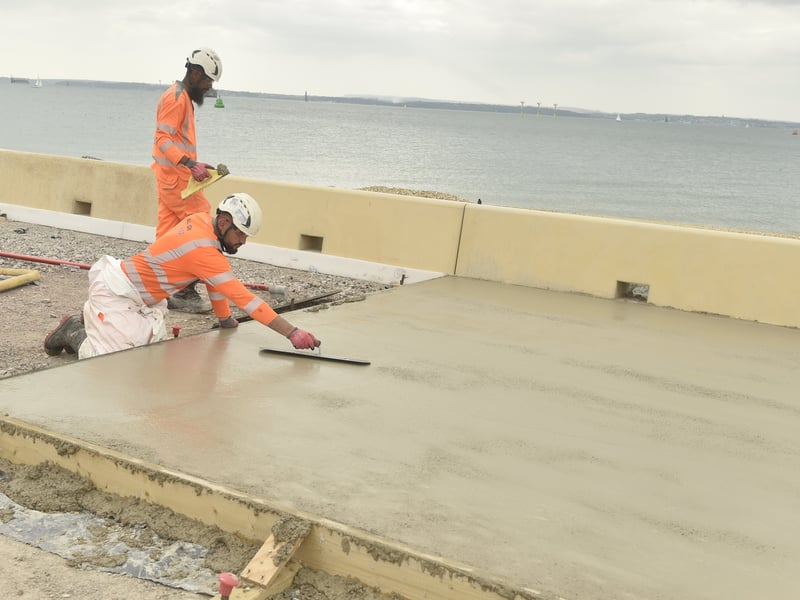 New promenade slabs are being laid.
Picture: Sarah Standing (240725-7233)