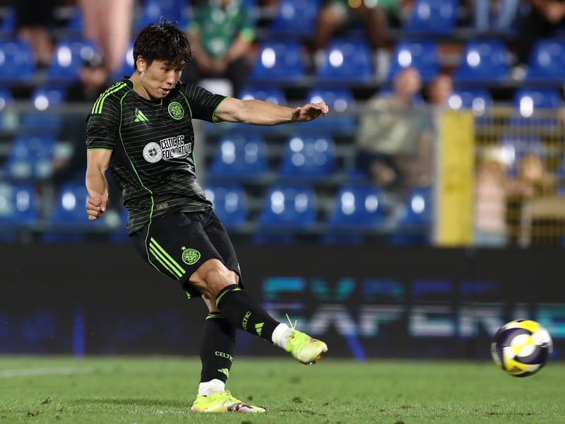 Shin Yamada of Celtic scores from the penalty spot during the Como Cup shootout against Al-Ahli