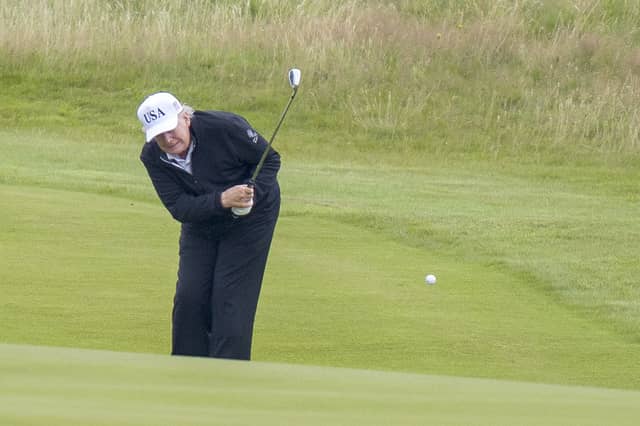 US President Donald Trump plays golf at his Trump Turnberry golf course in South Ayrshire