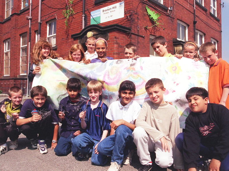 Children at Bracken Hill School, Sheffield, who worked with local sculptor Gillian Brent to make giant steel flower sculptures to attach to the school walls