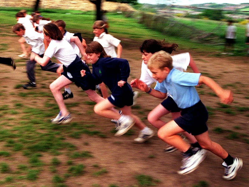 Year 5 and 6 pupils at Birley Spa Primary School, Hackenthorpe, Sheffield, in action during their athletics training in May 1999