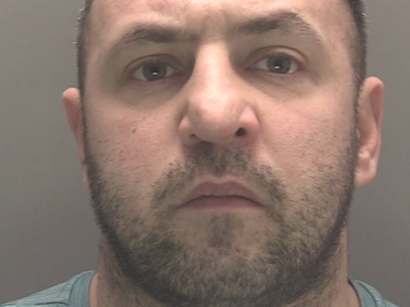 Bradley Jones, 33, of no fixed abode but originally from Wigan, was also jailed for three years for taking part in disorder in Southport. Jones was captured on CCTV throwing missiles at officers and their vehicles. At one point, he starts taking items out of a wheelie bin and throws them at a police carrier.