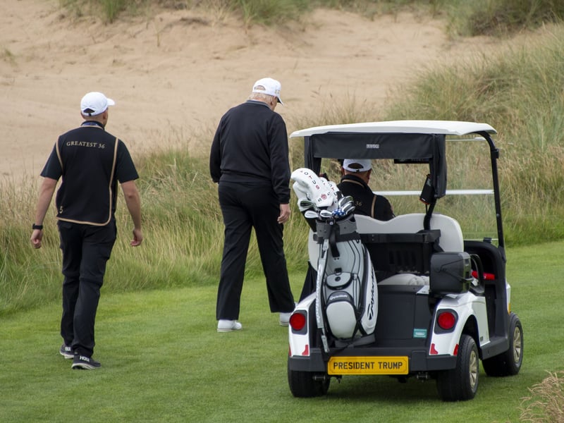 President Trump playing a round at the New Course.