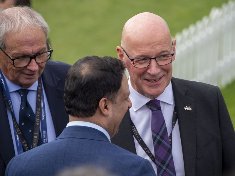 John Swinney chatting with Anas Sarwar