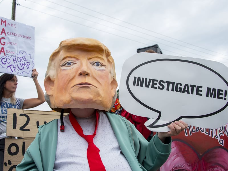 Following demonstrations in Aberdeen city centre on Saturday,  protestors gathered in Balmedie as US President Donald Trump visited his golf course at Menie. 

